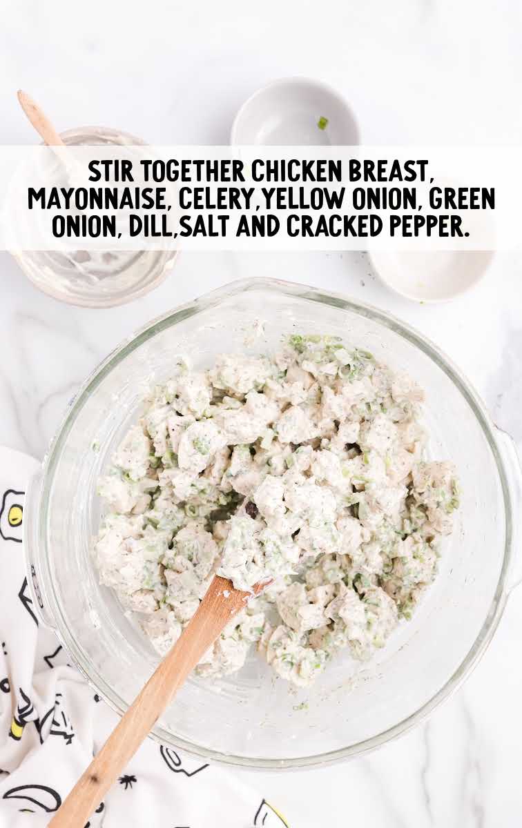 chicken breast, mayonnaise, celery, yellow onion, green onion, dill salt, and cracked pepper combined in a bowl