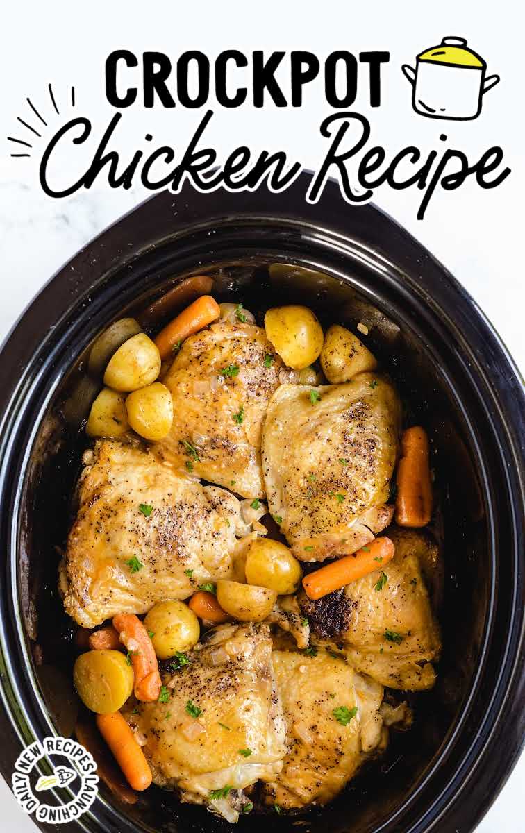 close up overhead shot of a crockpot of Crockpot Chicken Recipe with potatoes and carrots