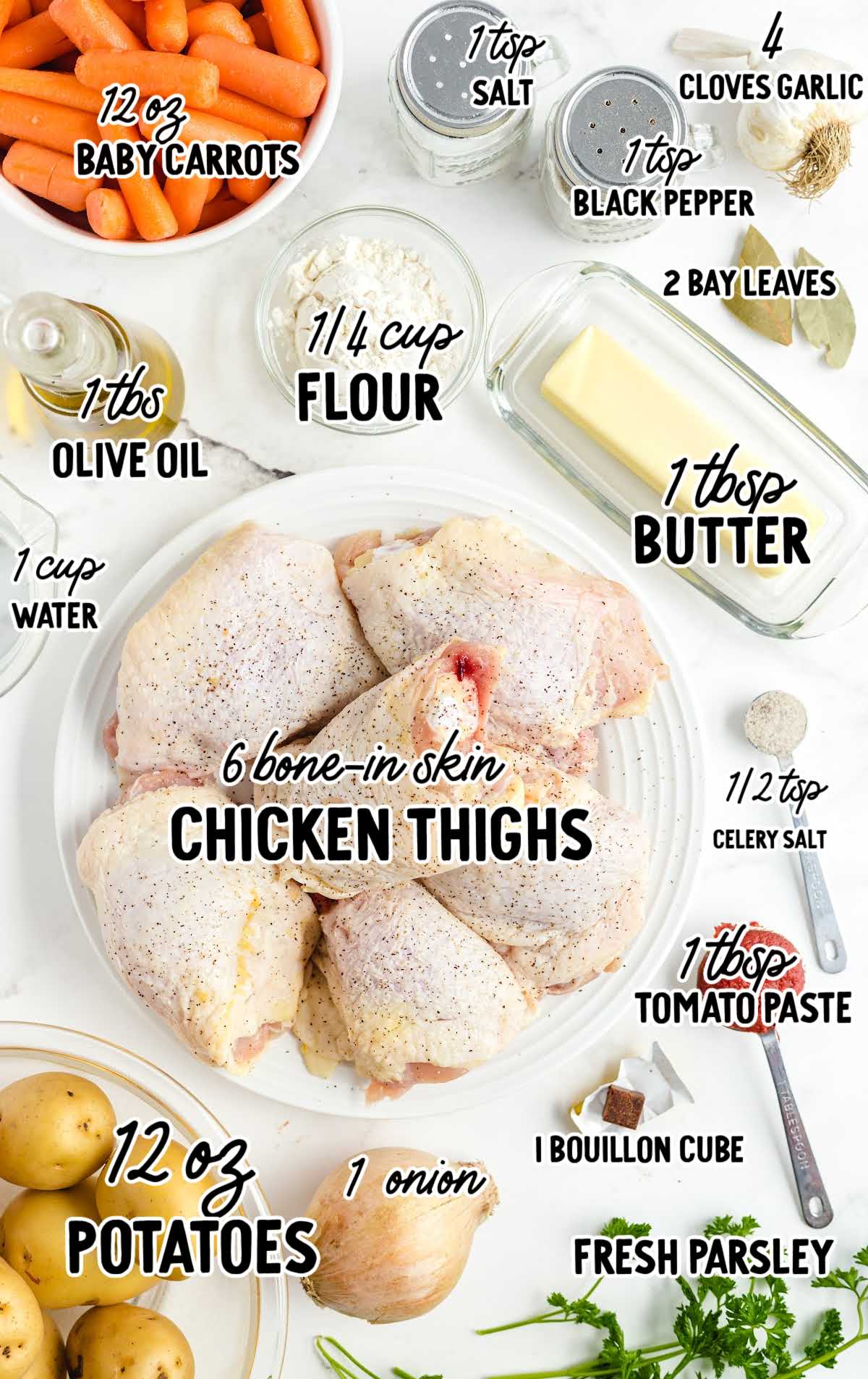 Ingredients for crockpot chicken including cream cheese, ranch seasoning, chicken breasts, and cream of chicken soup arranged on a marble counter.