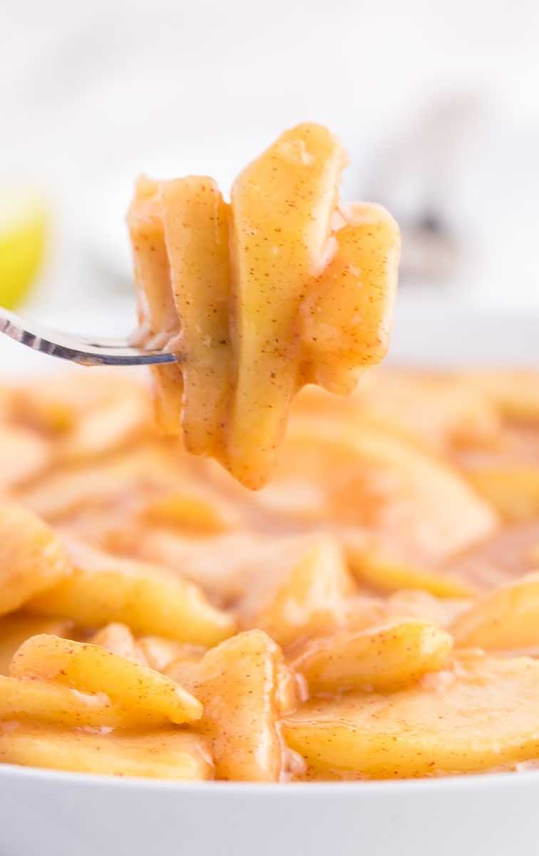 close up shot of Fried Apples on a fork