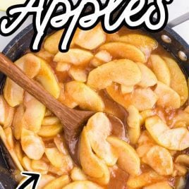 close up overhead shot of a pot of Fried Apples with a large wooden spoon