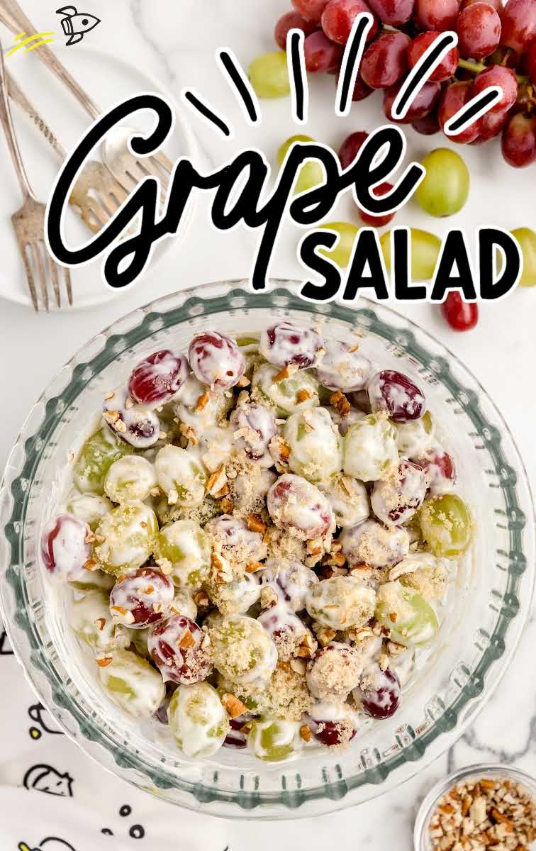 close up overhead shot of a bowl of Grape Salad garnished with chopped pecans