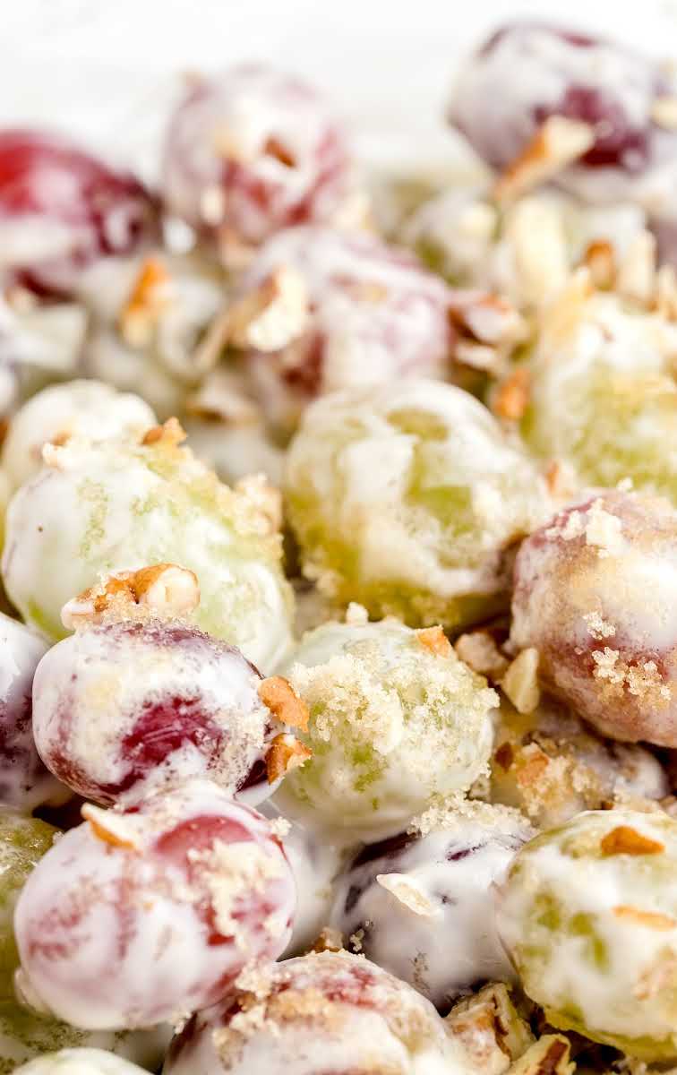 close up shot of Grape Salad garnished with chopped pecans