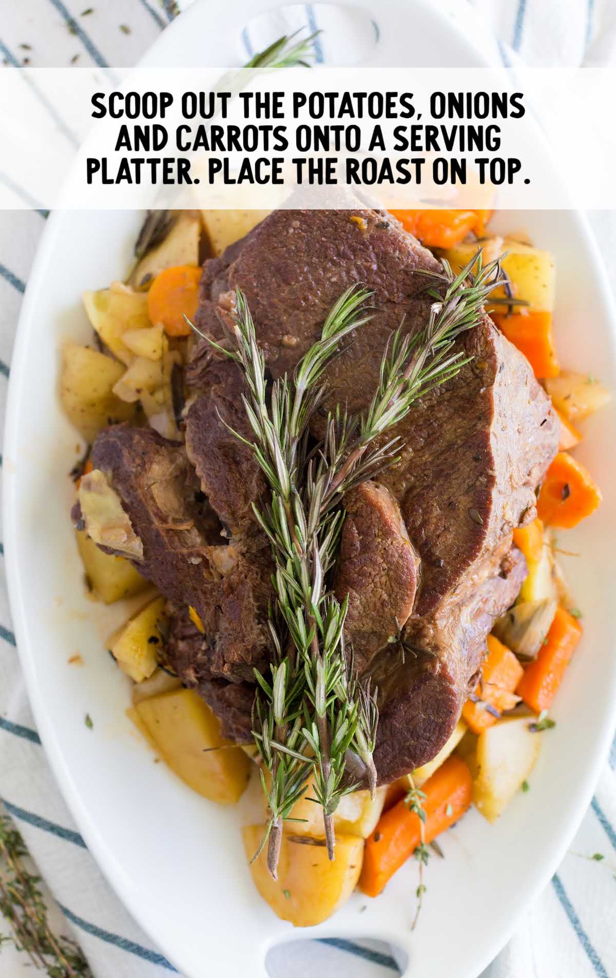 instant pot pot roast process shot of roast served over carrots and potatoes on a plate