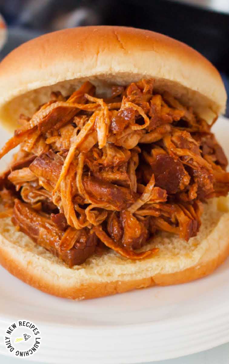 close up shot of a Instant Pot Pulled Pork sandwich on a plate