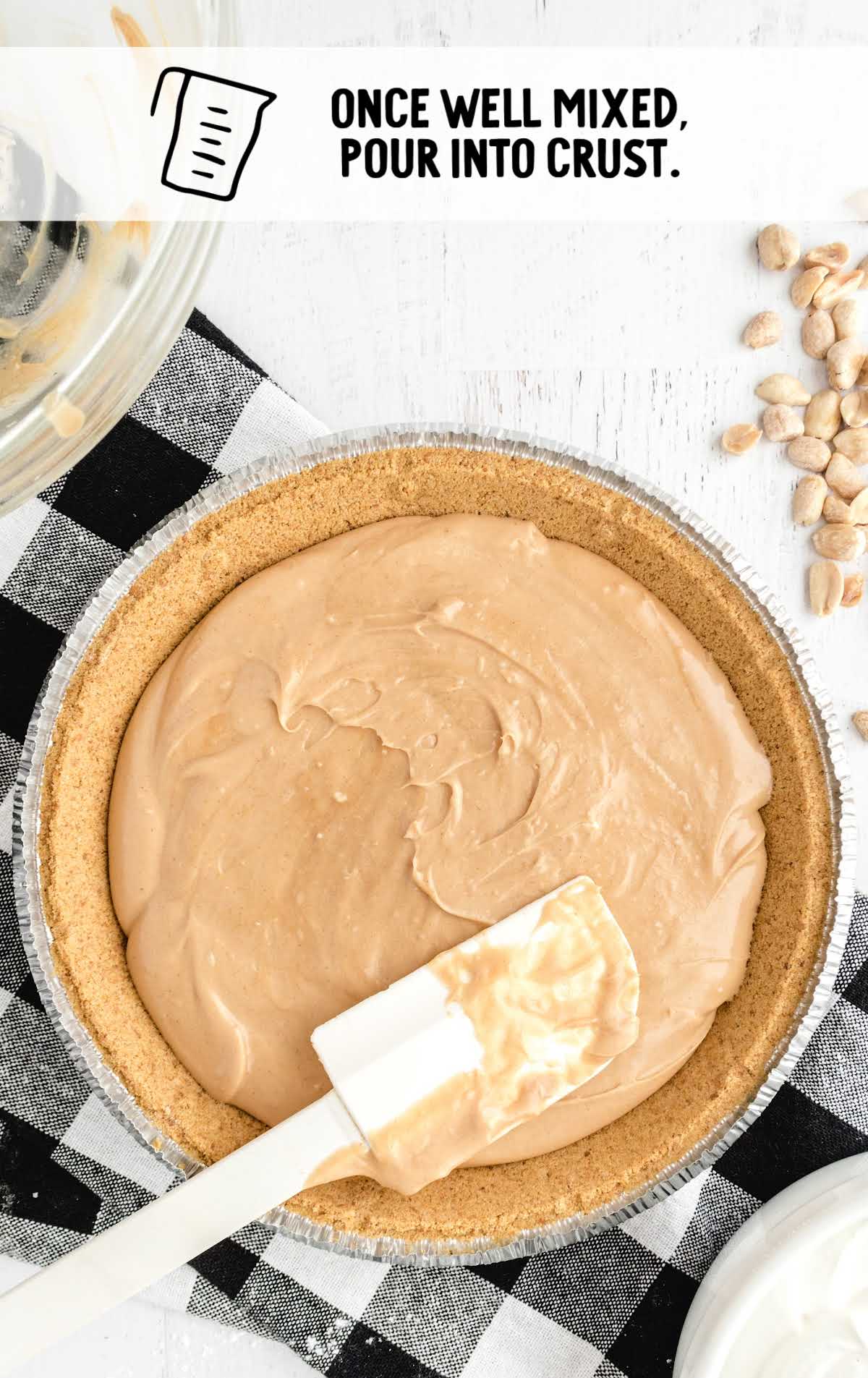 peanut butter mixture poured into the crust