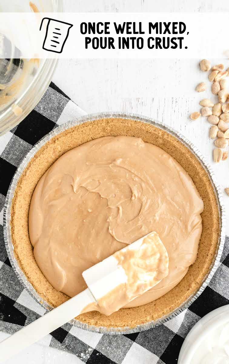 No Bake Peanut Butter Pie process shot of pie mixture being spread into pie dish