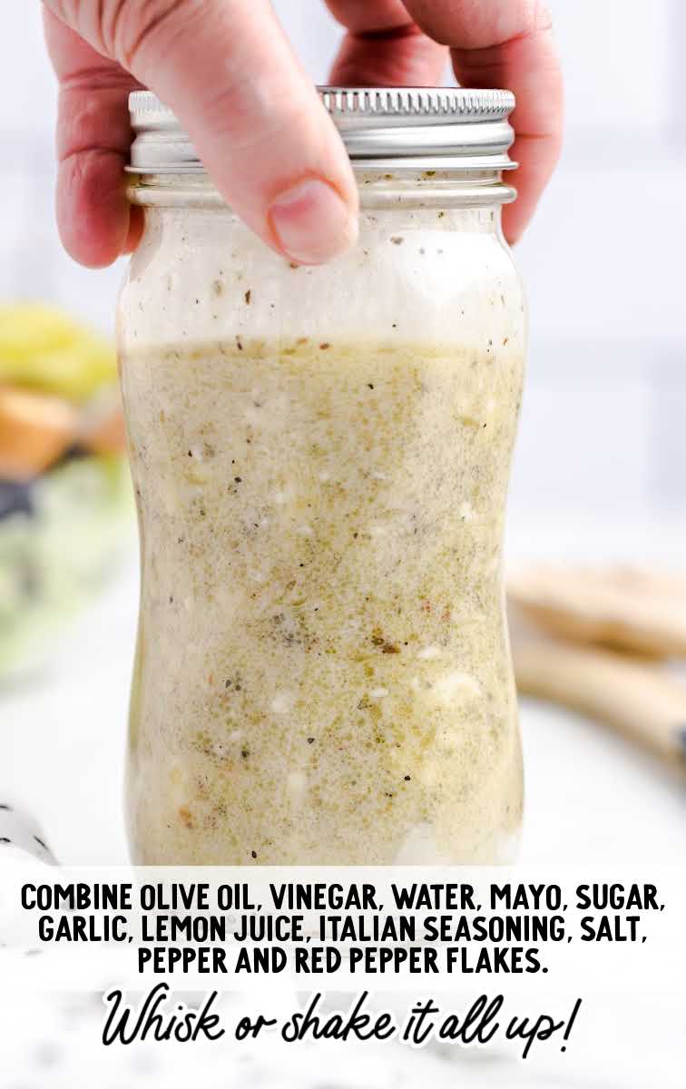 Olive Garden Salad Recipe process shot of salad dressing ingredients combined in a jar