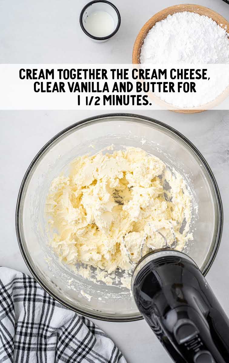 cream cheese, vanilla and butter blended together in a bowl