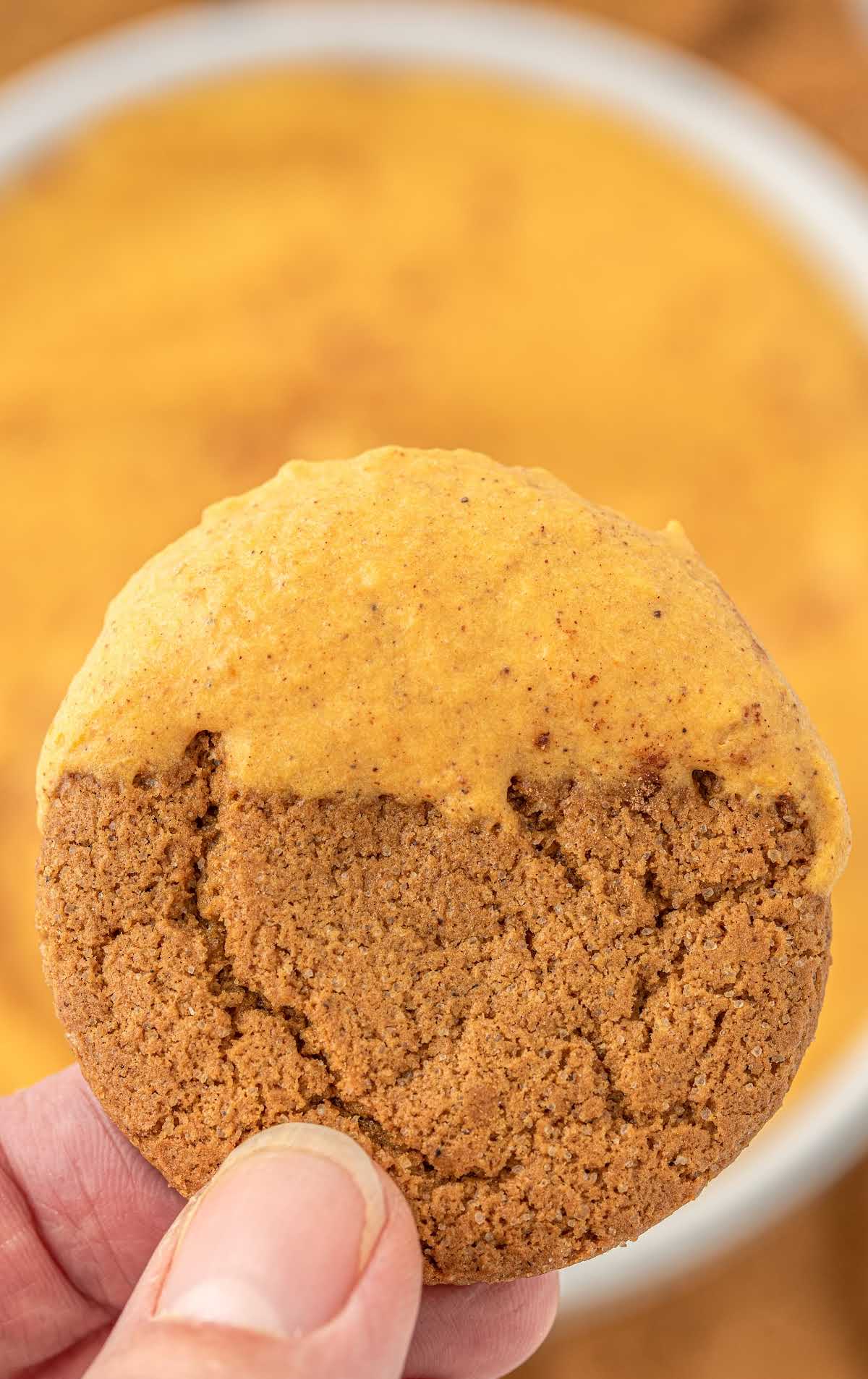 close up shot of a cookie dipped into Pumpkin Dip