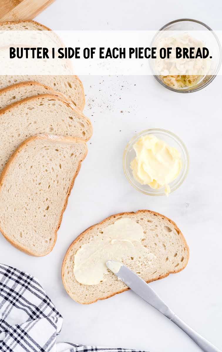 butter being spread on bread