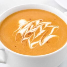 close up shot of a cup of butternut squash soup