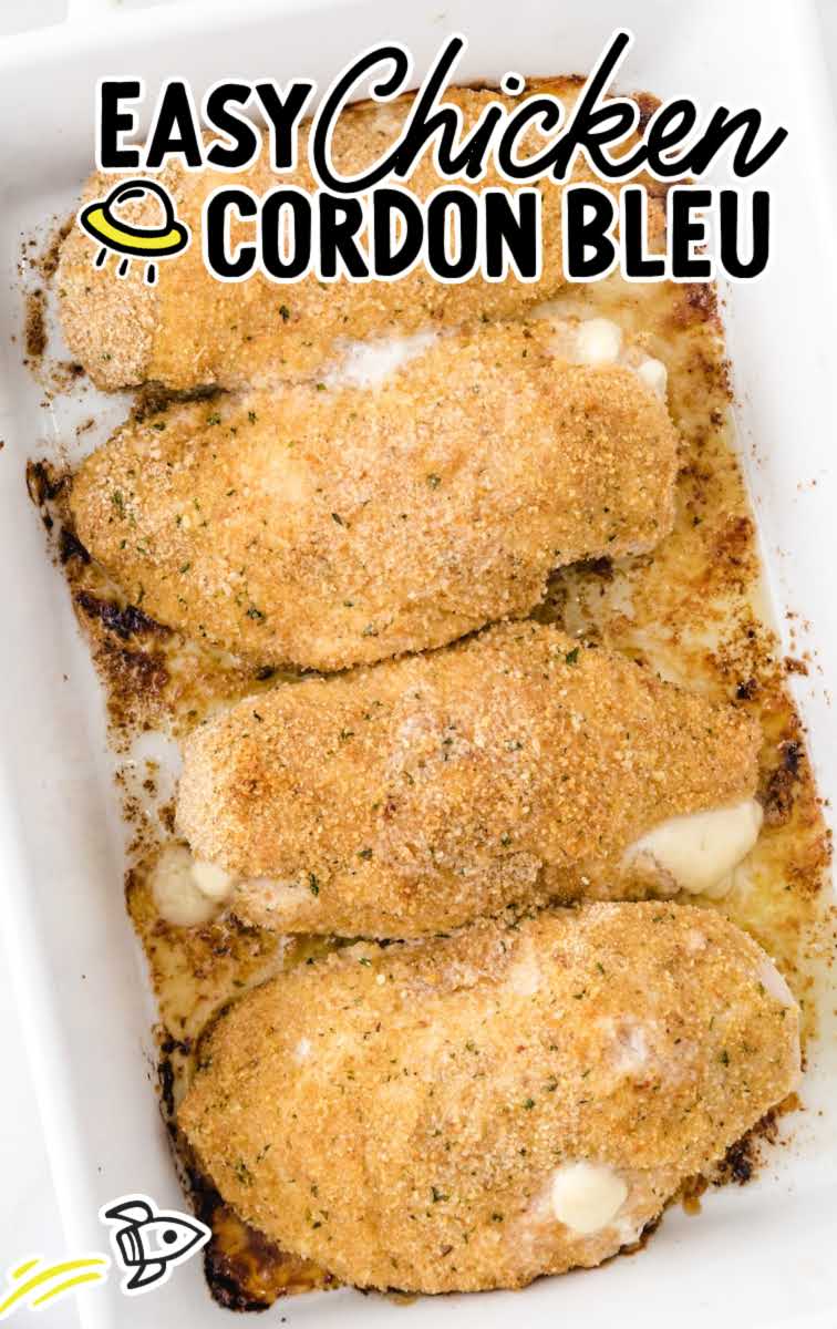 close up overhead shot of chicken cordon bleu in a baking dish