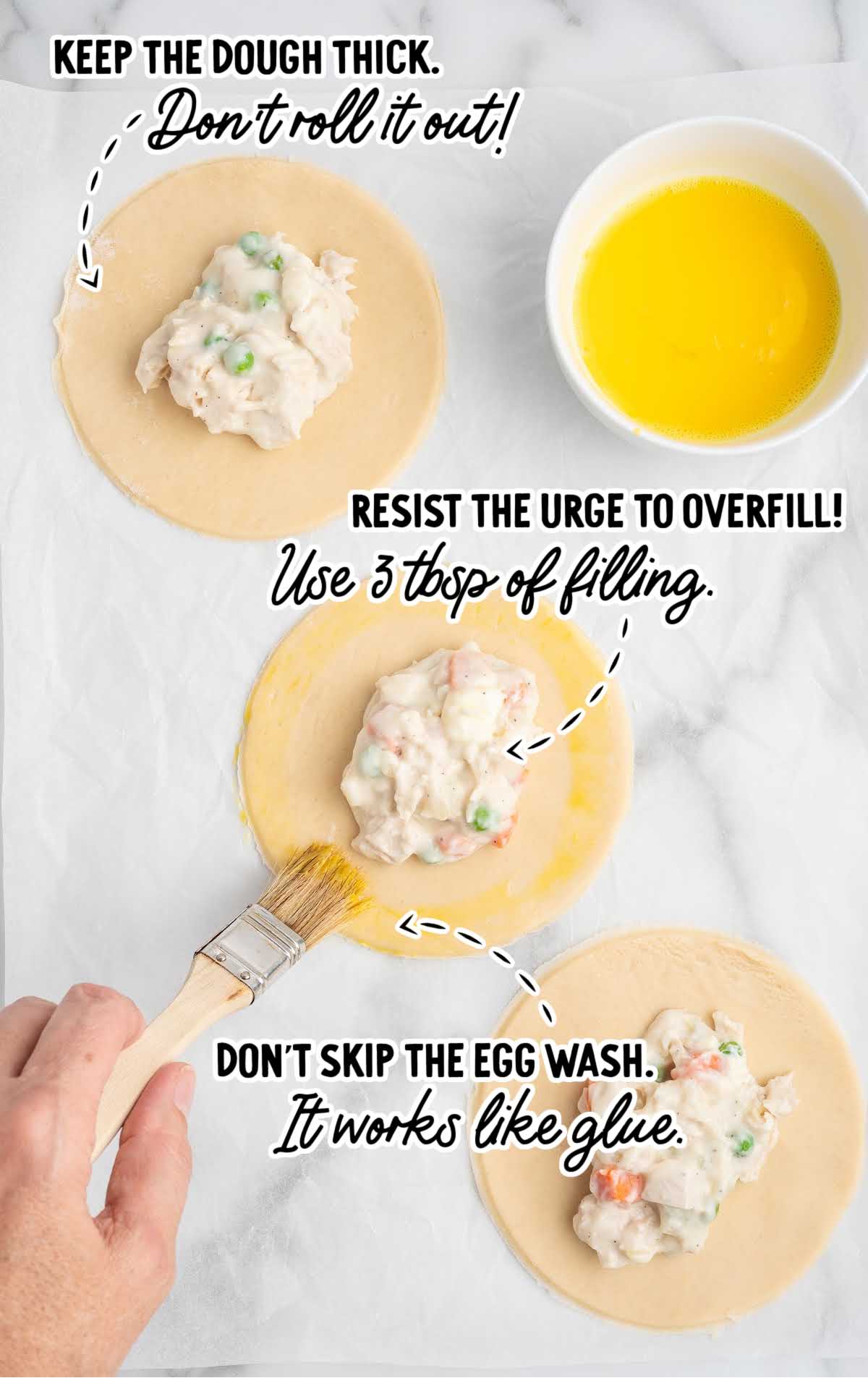 Filling chicken hand pies with creamy pot pie mixture, brushing edges with egg wash, and sealing before baking