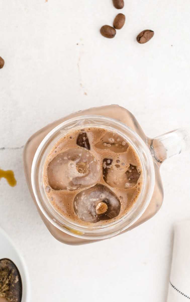 close up overhead shot of a glass of iced mocha