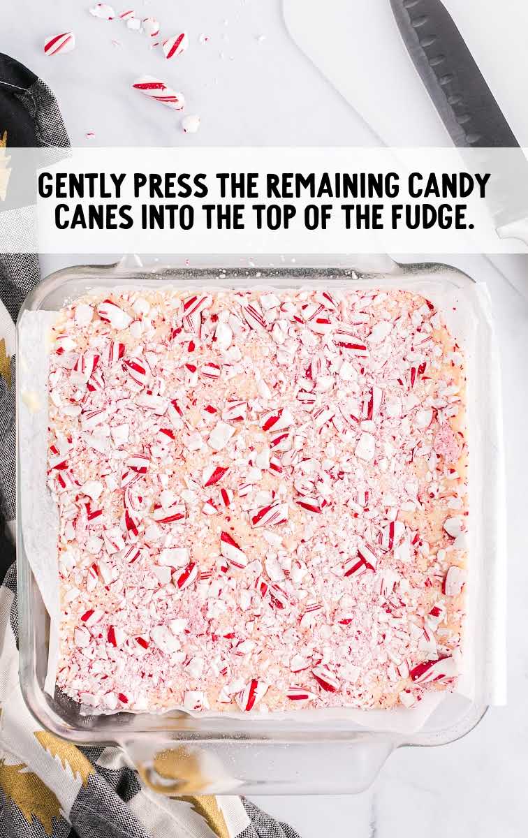 Candy Cane Fudge process shot of crushed candy canes pressed on top the fudge