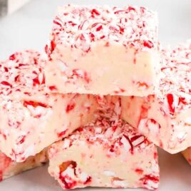 close up shot of Candy Cane Fudge stacked on top of each other