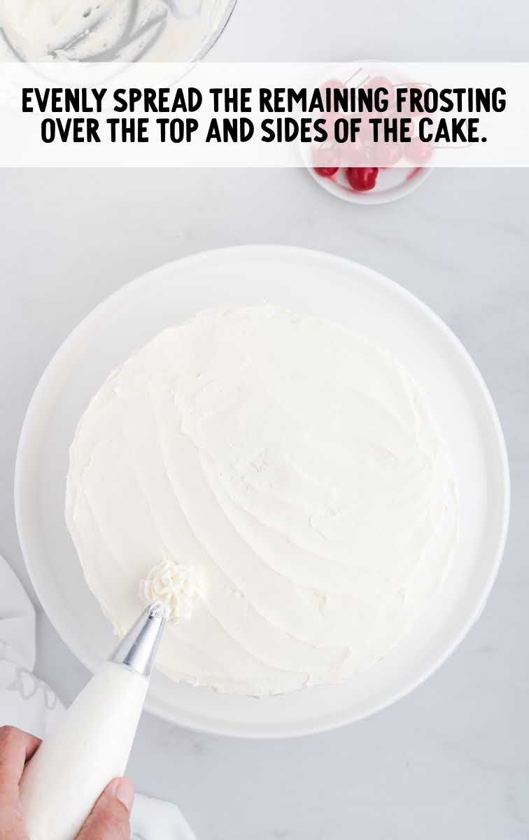 frosting spread over cake