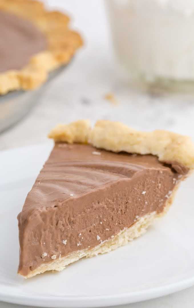 close up shot of a slice of Chocolate Pie on a plate
