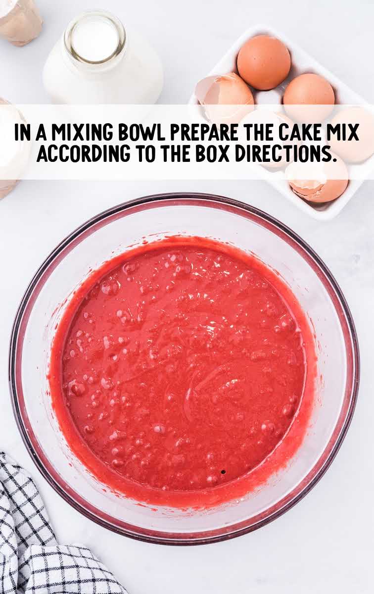 Christmas Red Velvet Poke Cake process shot of cake mix ingredients in a bowl