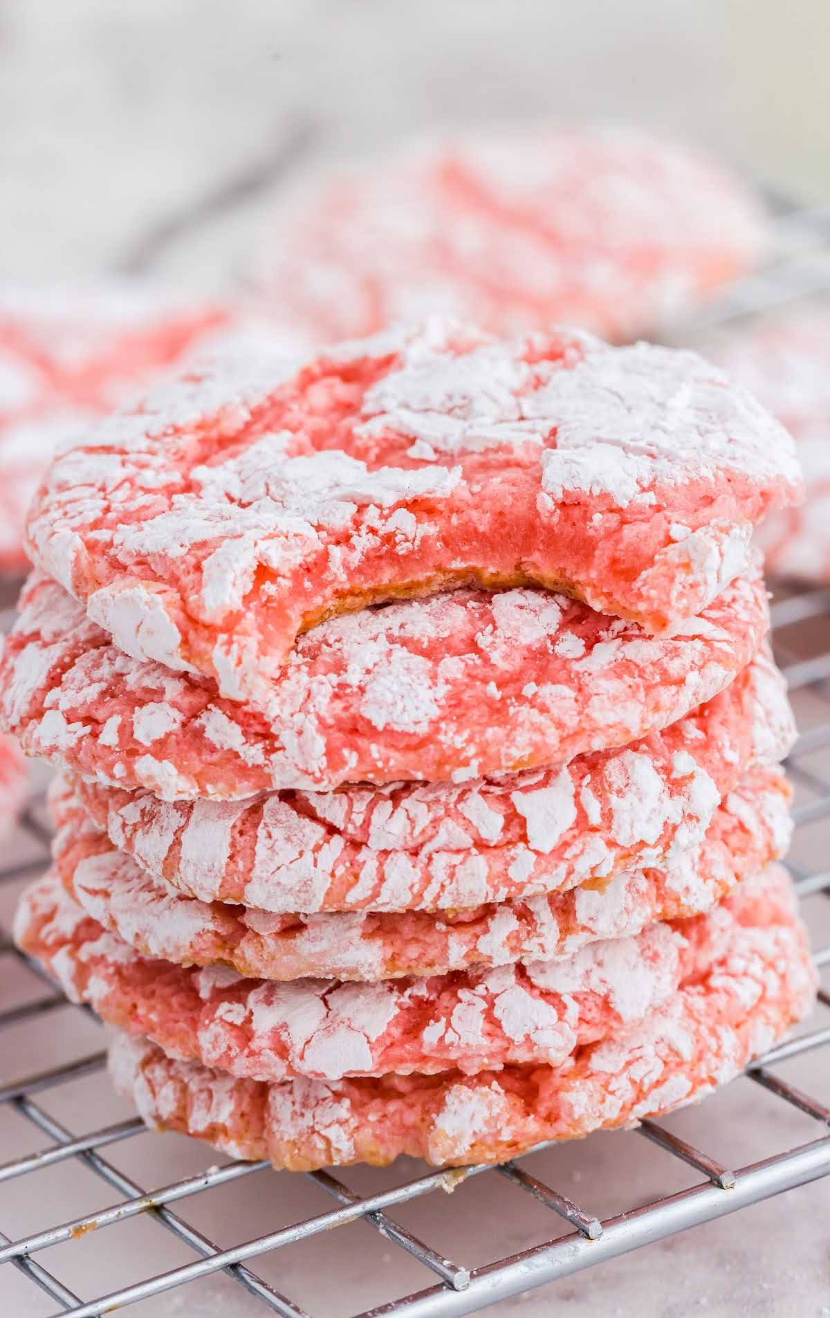 Cool Whip Cookies stacked on a cooling rack