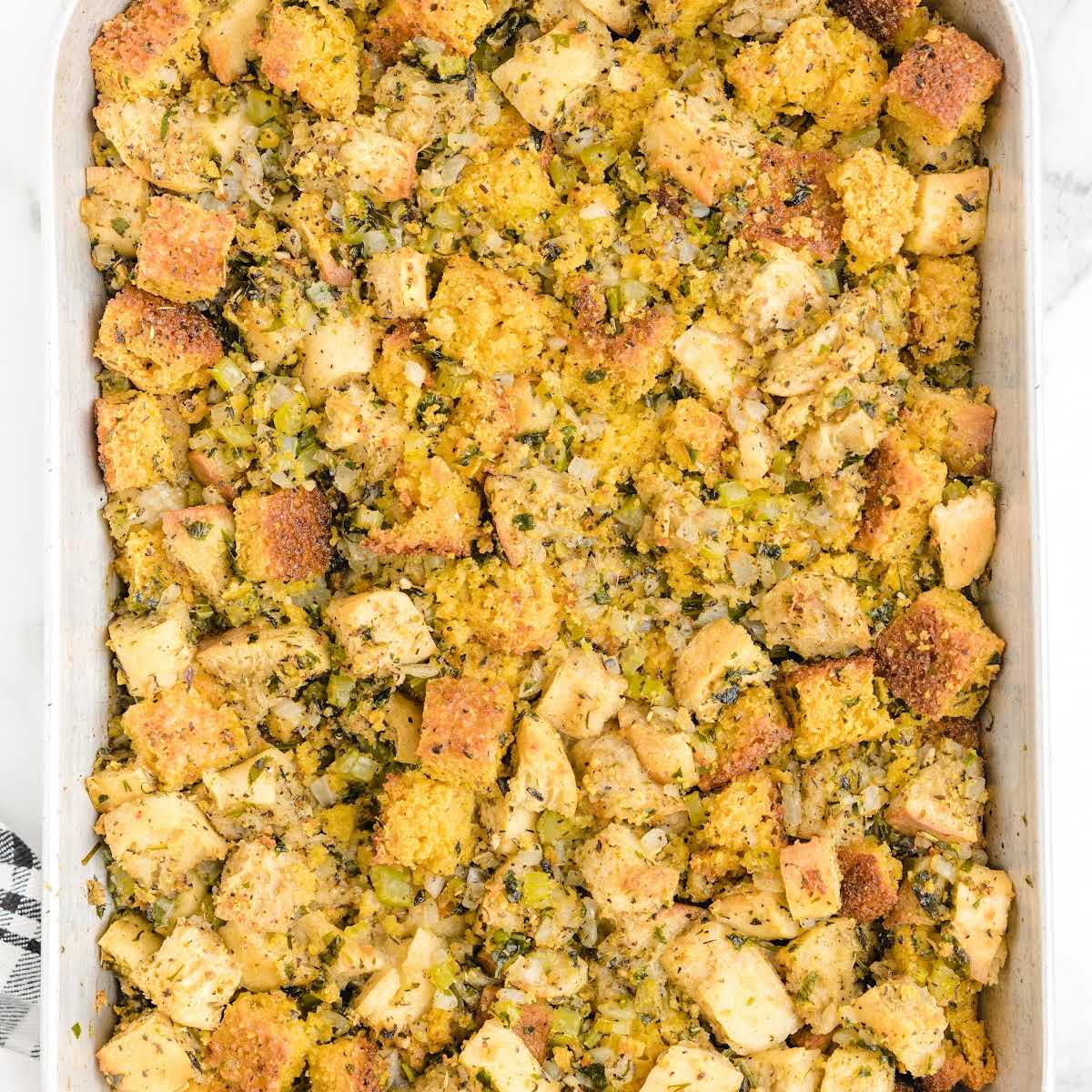 close up overhead shot of a pan of Cornbread Dressing
