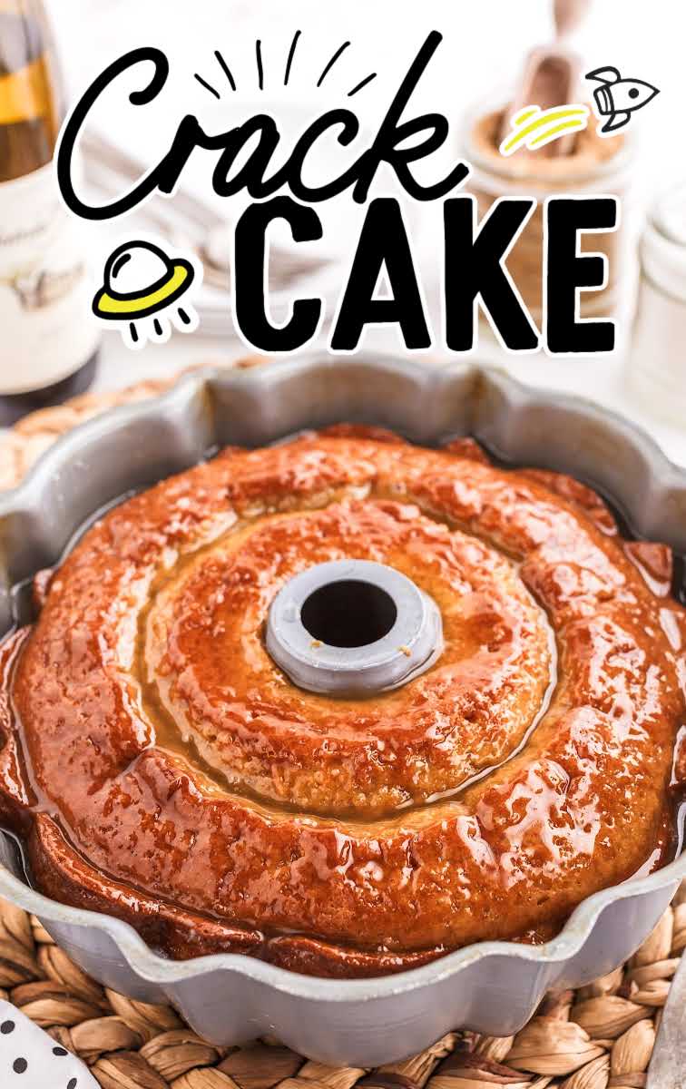 close up shot of Crack Cake topped with a glaze in a bundt pan