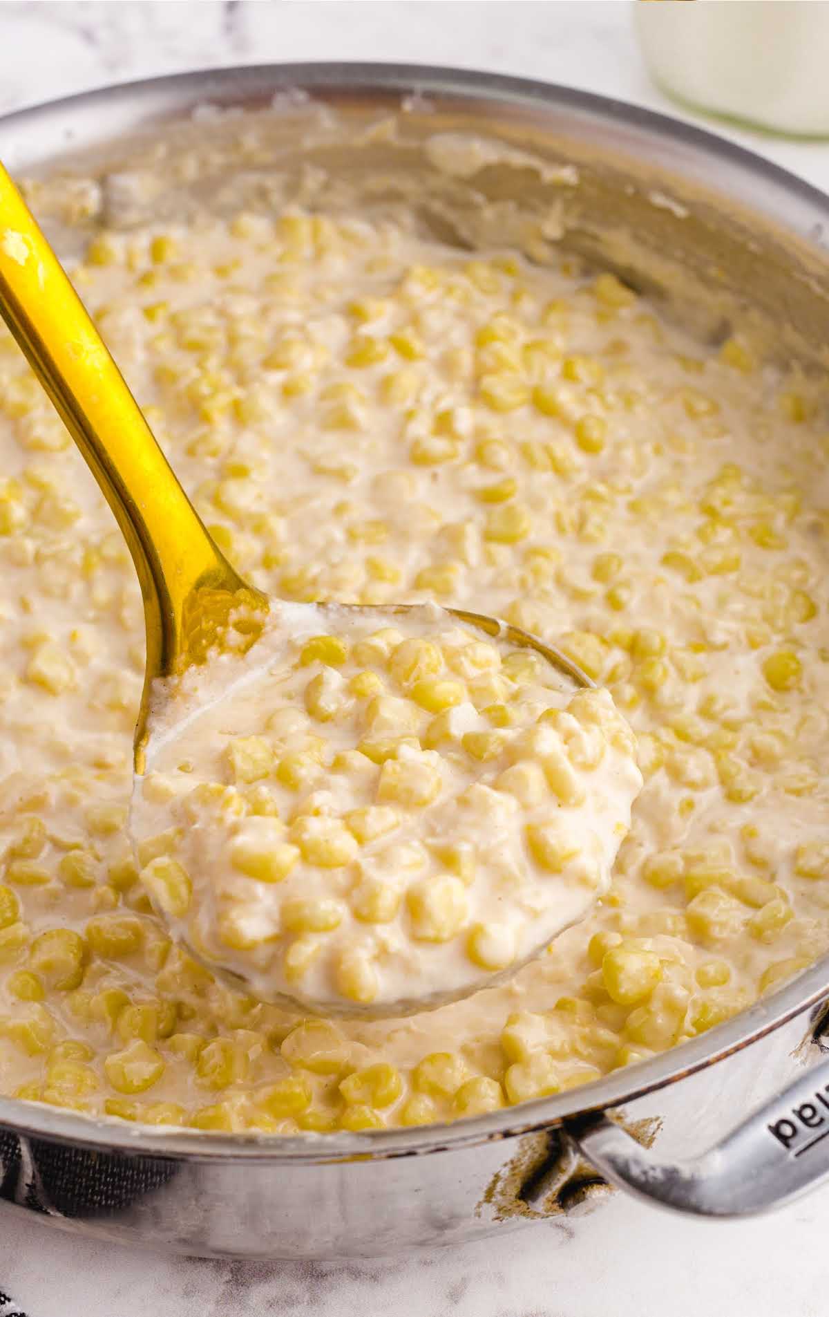 close up shot of Creamed Corn in a pot