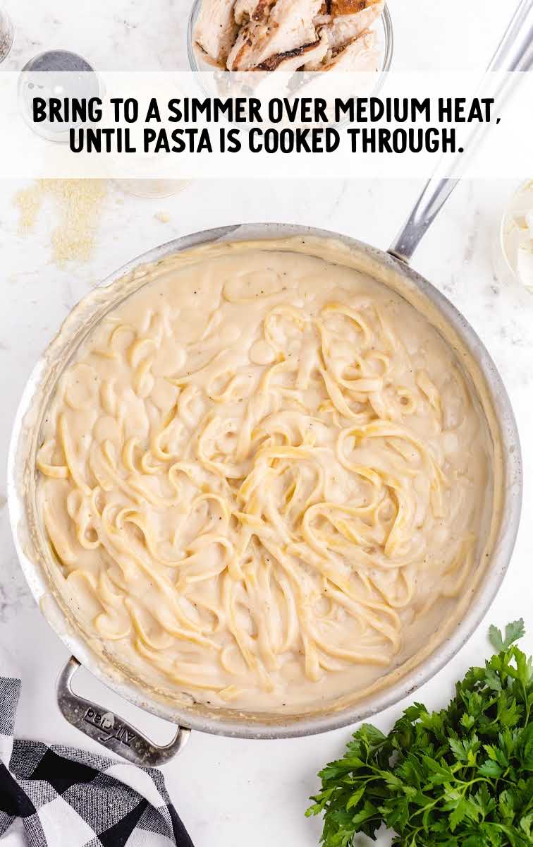 Creamy Italian Chicken with Pasta process shot of pasta in a skillet