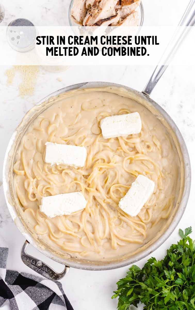 Creamy Italian Chicken with Pasta process shot of cream cheese added to the skillet