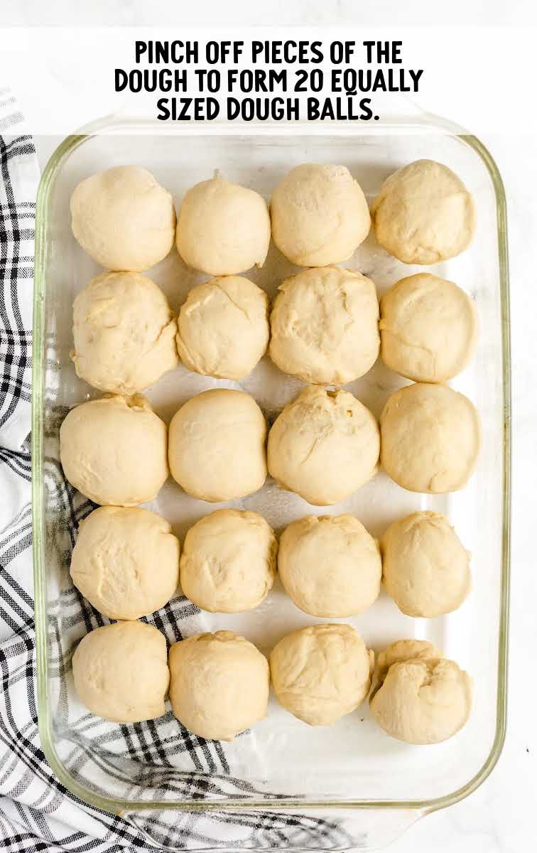 Dinner Rolls process shot of dough balls in a baking dish