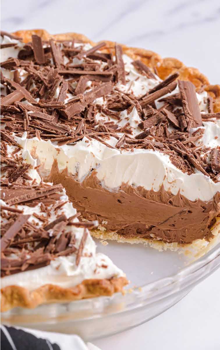 close up shot of french silk pie garnished with chopped chocolate in a baking dish