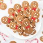 close up shot of Gingerbread Men Cookies piled on a plate