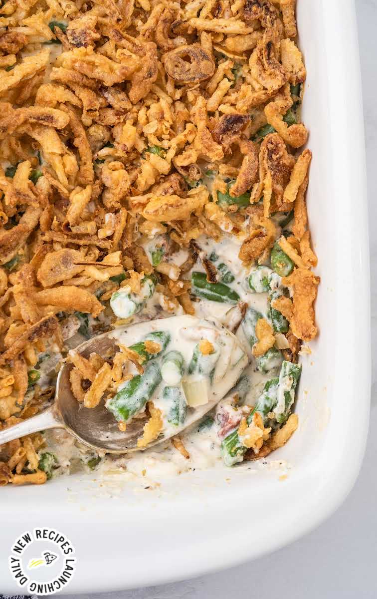 close up overhead shot of Green Bean Casserole in a casserole dish and on a spoon