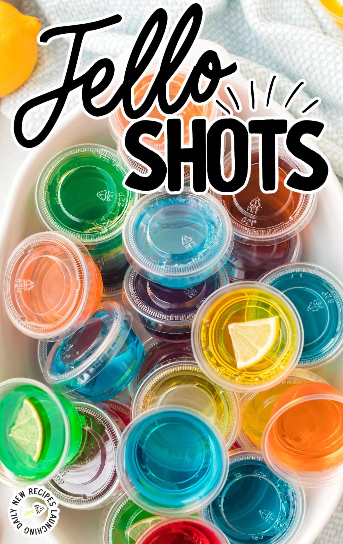 close up overhead shot of plastic containers of Jello Shots in a bowl