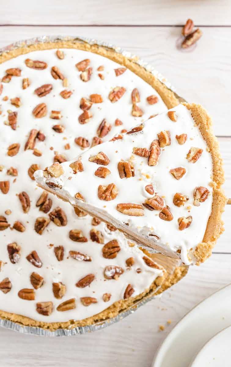 close up overhead shot of a Layered Pumpkin Spice Jello Pie topped with pecans