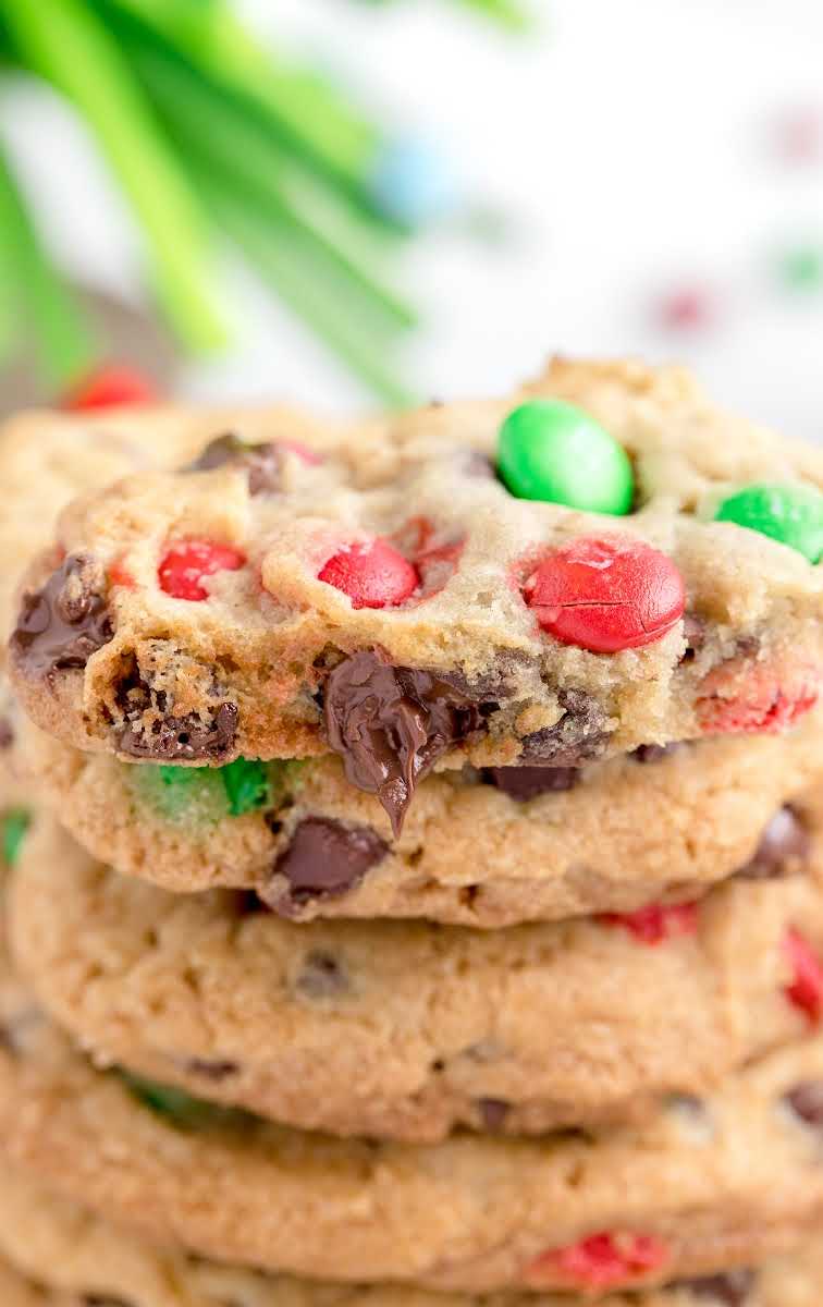 close up shot of M&M Christmas Cookies stacked on top of each other