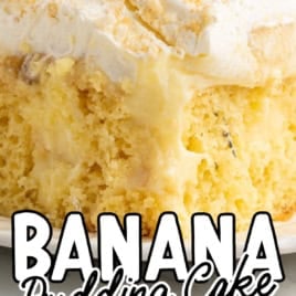 A close-up of creamy Banana Pudding Cake topped with whipped cream and a vanilla wafer, with banana slices and more whipped topping shown on a cake in a metal pan below. Text over the image reads Banana Pudding Cake Recipe.