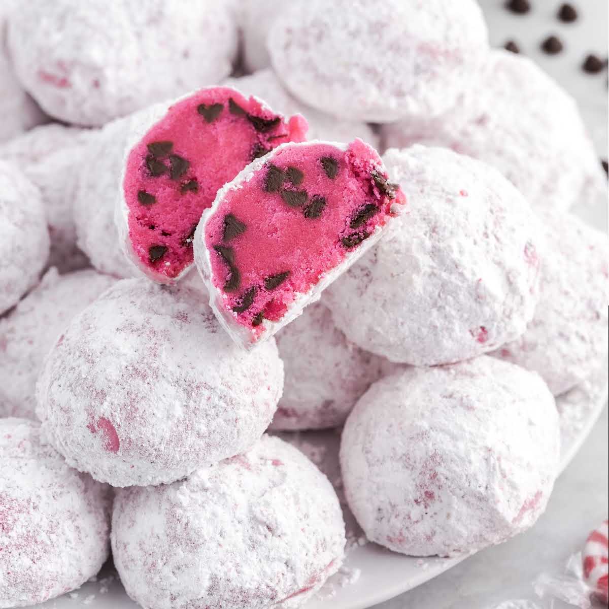 close up shot of a plate of Peppermint Snowball Cookies