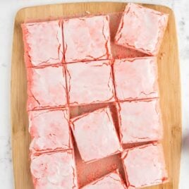 close up overhead shot of Strawberry Brownies on a wooden board