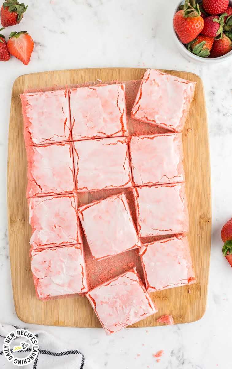 close up overhead shot of Strawberry Brownies on a wooden board