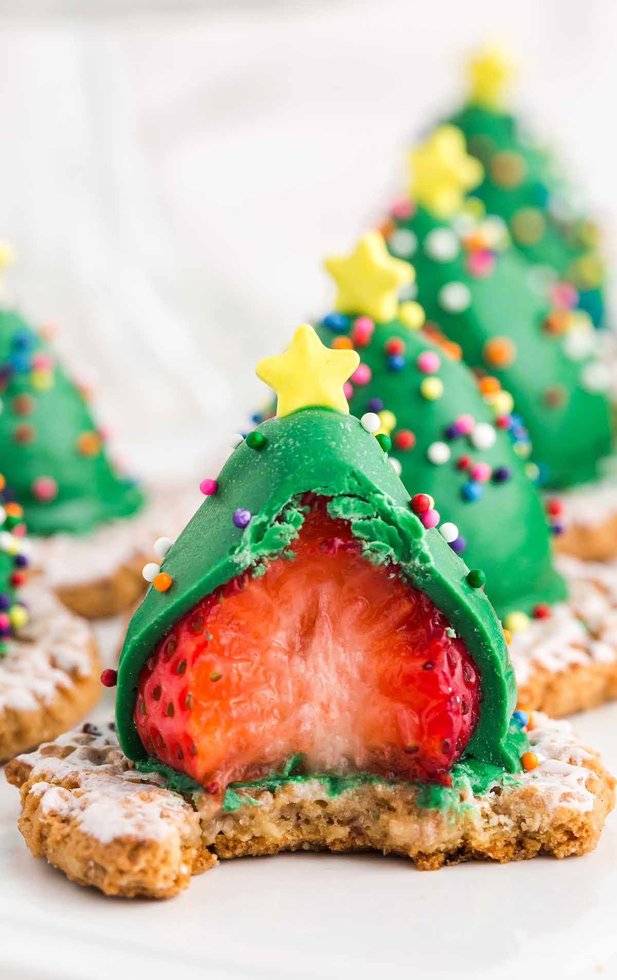 close up shot of a Strawberry Christmas Tree with a bite taken out of it