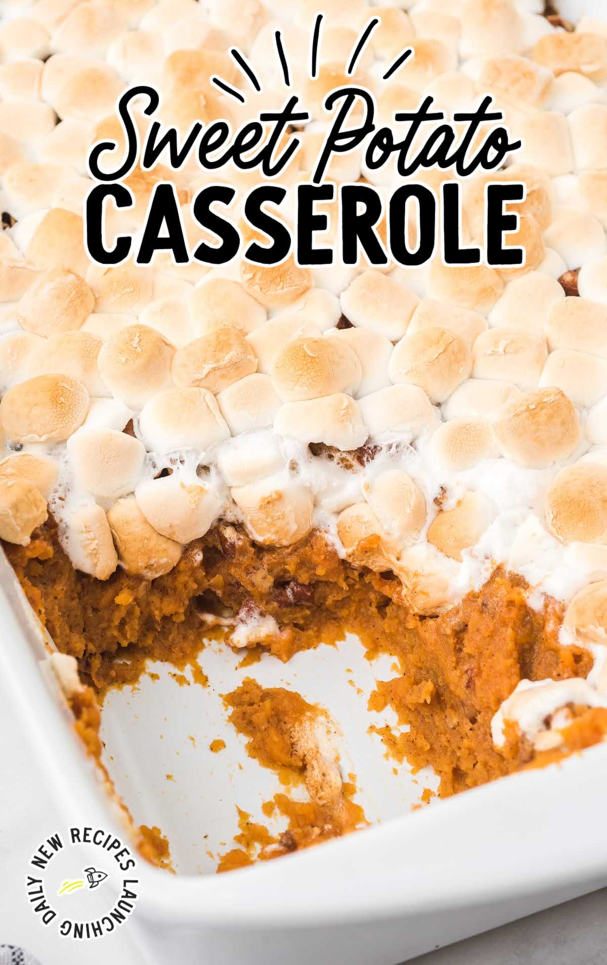 close up shot of Sweet Potato Casserole in a baking dish with a slice take out of it