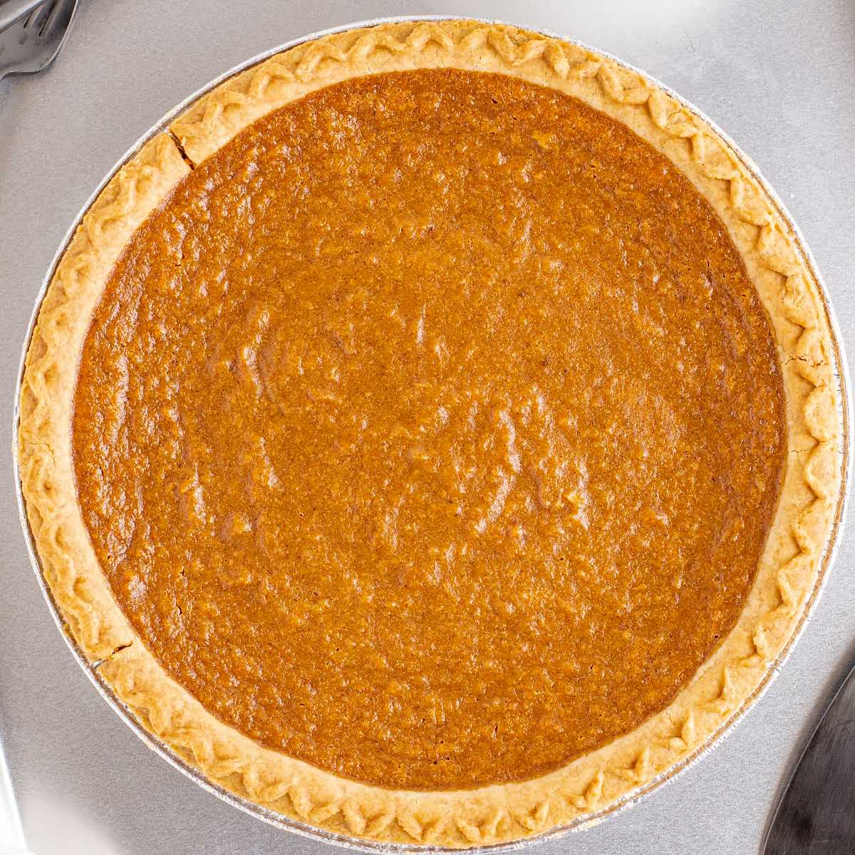 close up overhead shot of a whole Sweet potato pie