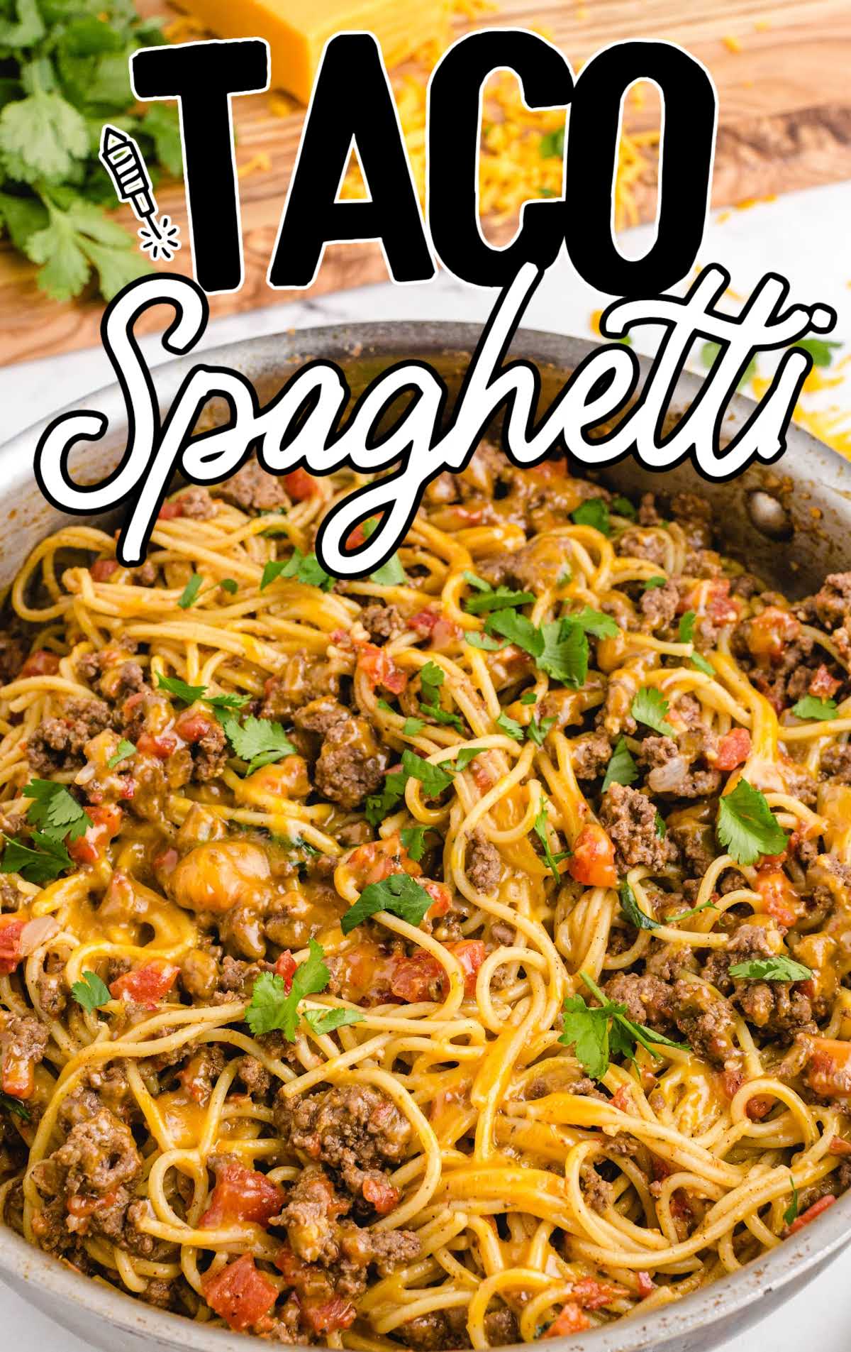 close up shot of Spaghetti topped with cilantro in a skillet