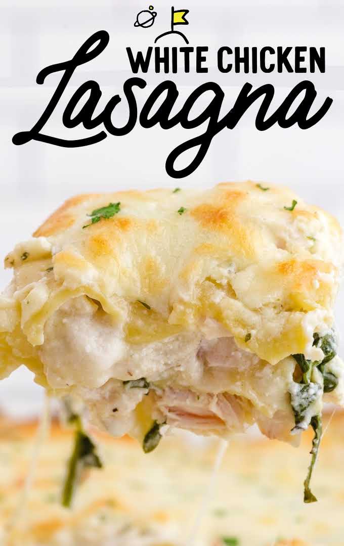 close up shot of a slice of White chicken lasagna garnished with parsley