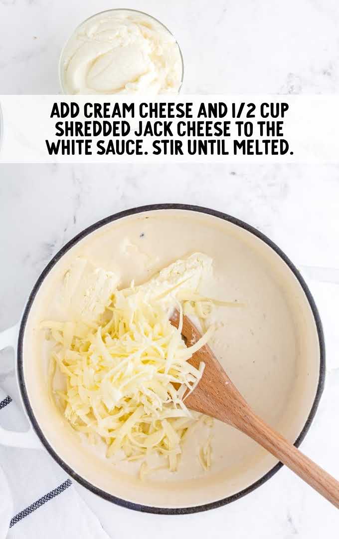 cream cheese and shredded jack cheese added to the white sauce 