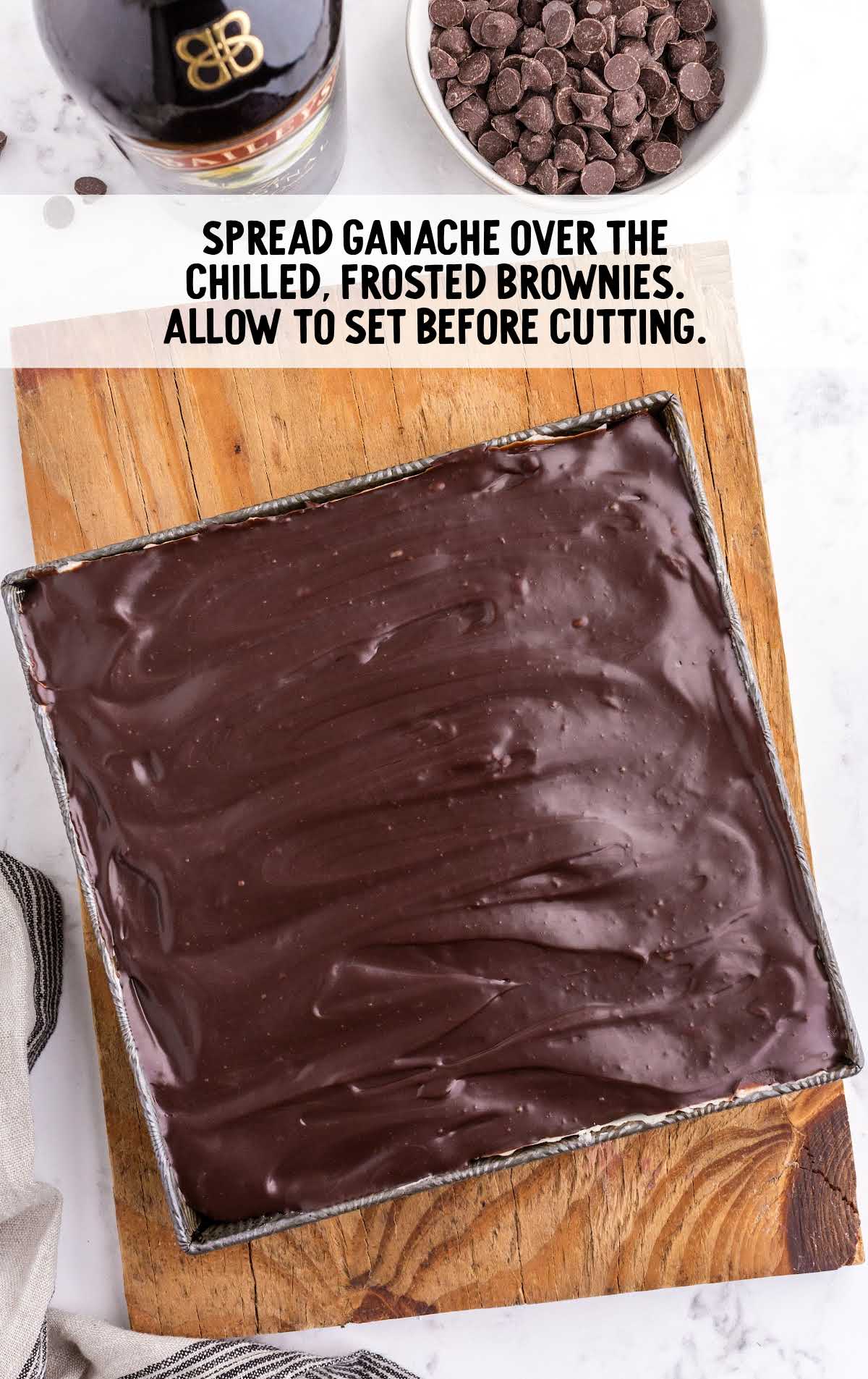 ganache spread on top of brownies

