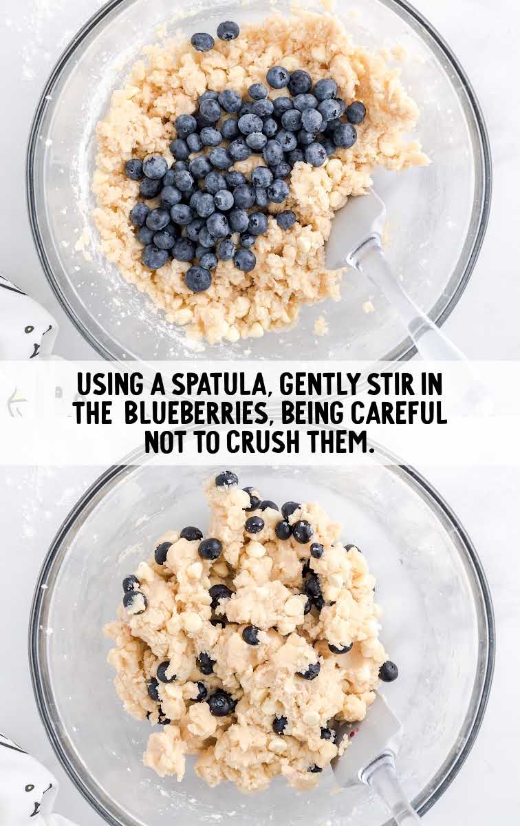 blueberries added to a bowl of ingredients