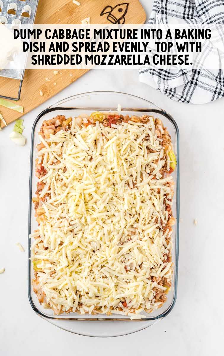 Cabbage Roll Casserole process shot of cabbage mixture placed into a baking dish and topped with mozzarella cheese